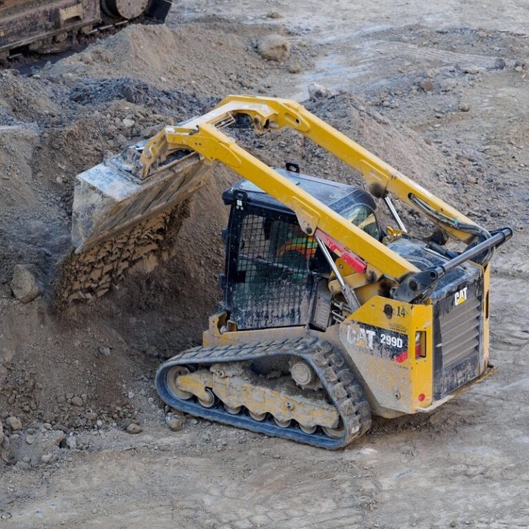Cat Skidsteer on a construction site moving dirt